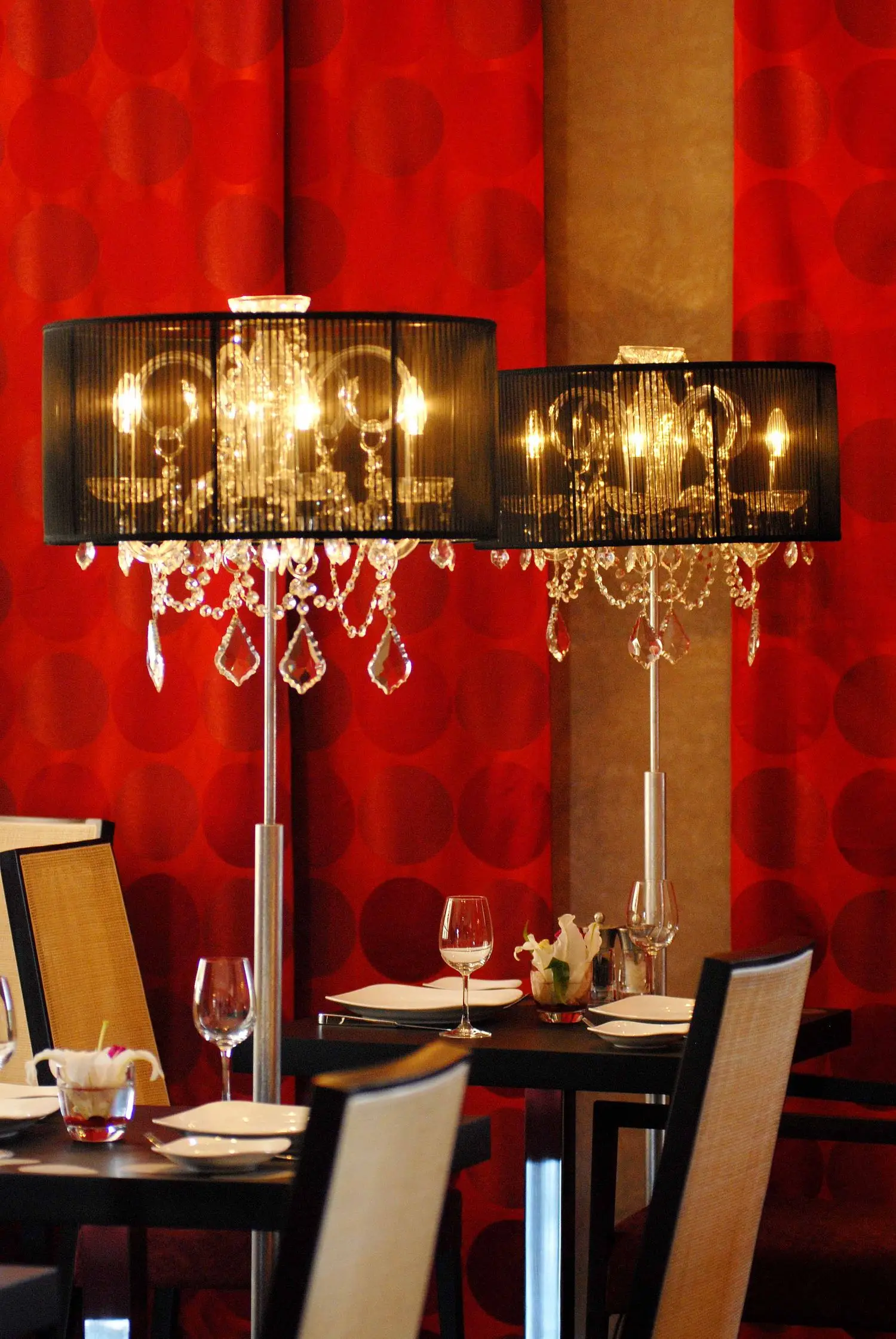 Warm red dining room with table lighting