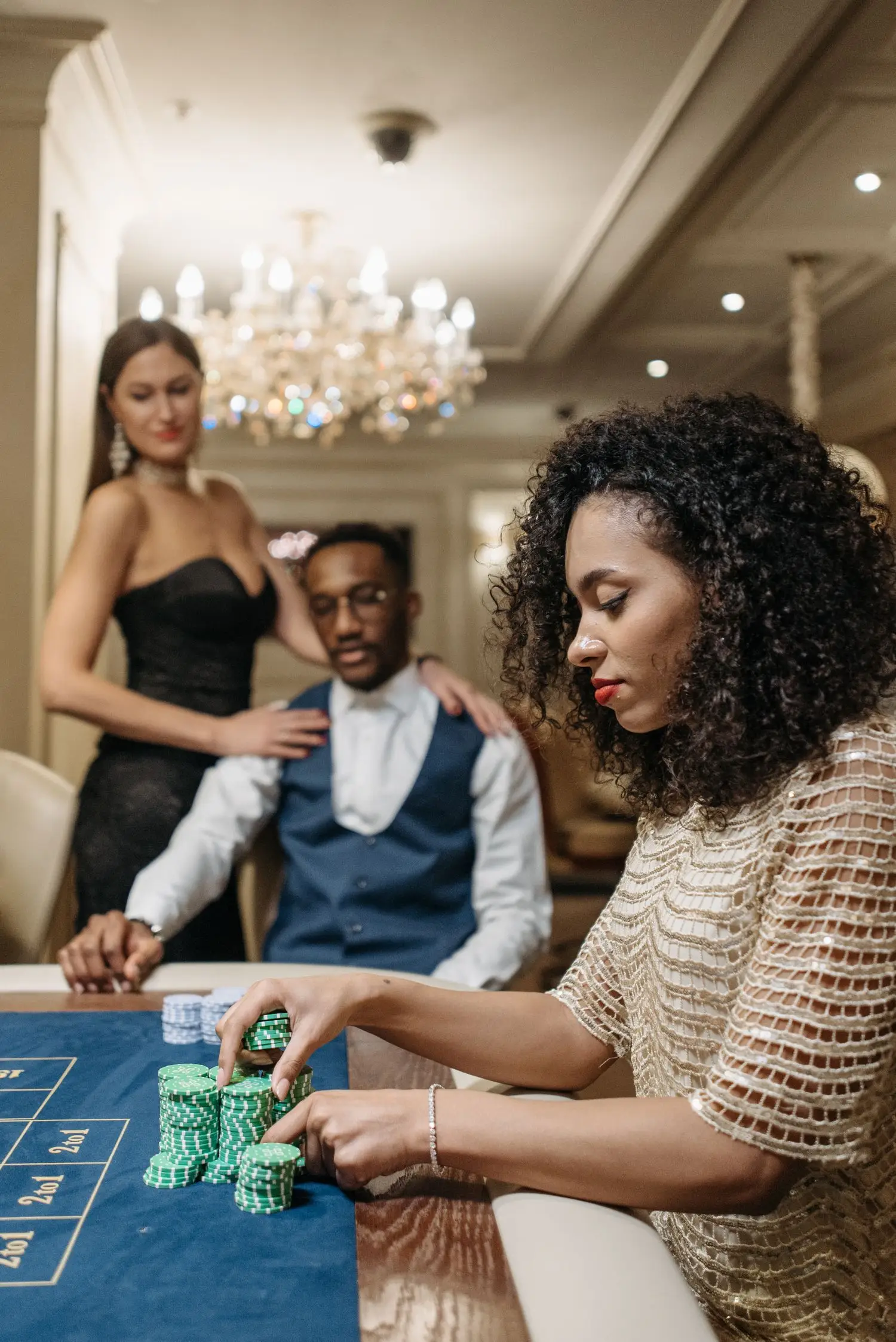 Guests playing at a casino table